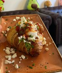 A croissant with smashed avocado, chives * chilli jam!